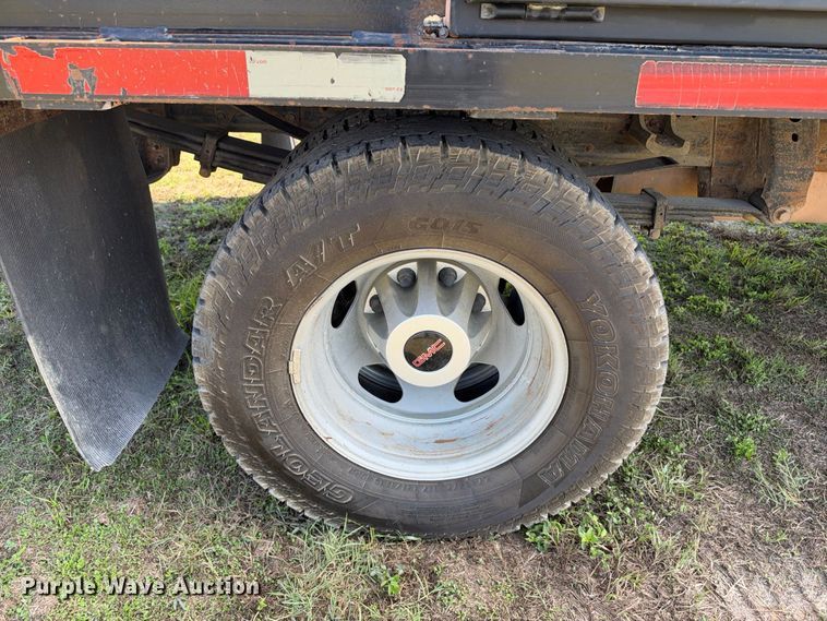 image for item FN3757 2021 GMC Sierra 3500 4X4 Crew Cab flatbed pickup truck