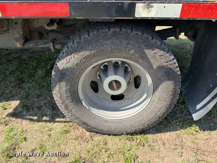 image for item FN3757 2021 GMC Sierra 3500 4X4 Crew Cab flatbed pickup truck