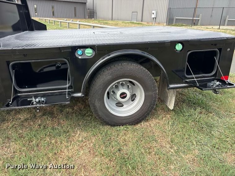 image for item FN3770 2020 GMC 3500 Crew Cab flatbed pickup truck