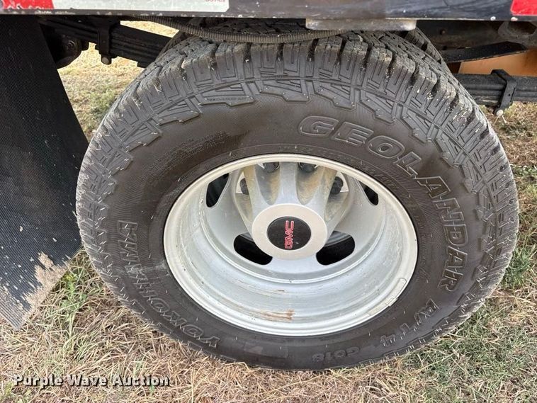 image for item FN3771 2021 GMC Sierra 3500 Crew Cab flatbed pickup truck