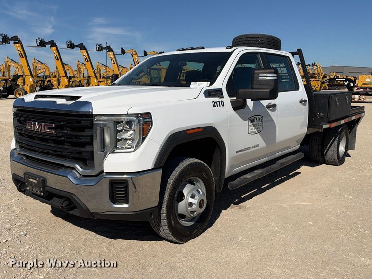 image for item FN3804 2021 GMC Sierra 3500 HD 4X4 Crew Cab flatbed pickup truck