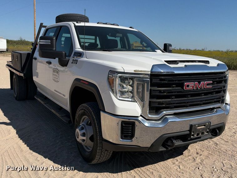 image for item FN3804 2021 GMC Sierra 3500 HD 4X4 Crew Cab flatbed pickup truck