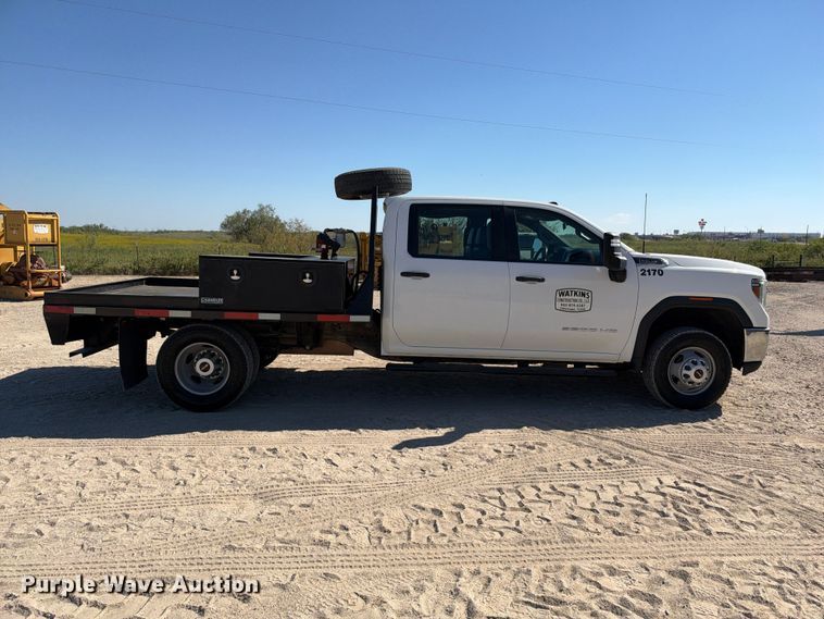 image for item FN3804 2021 GMC Sierra 3500 HD 4X4 Crew Cab flatbed pickup truck