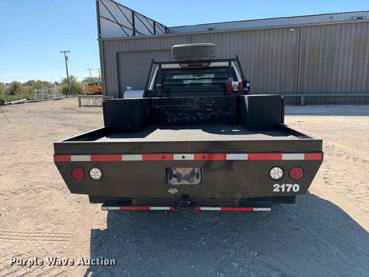 image for item FN3804 2021 GMC Sierra 3500 HD 4X4 Crew Cab flatbed pickup truck