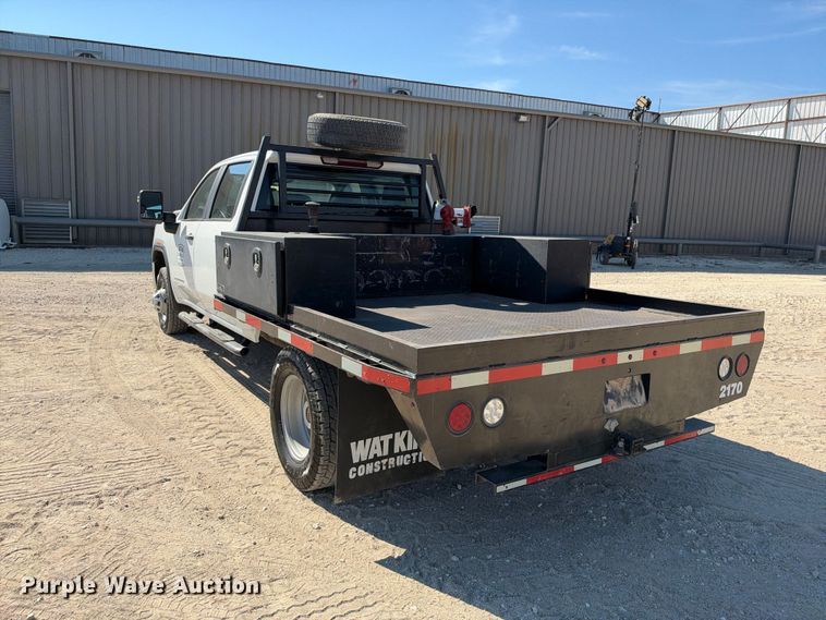 image for item FN3804 2021 GMC Sierra 3500 HD 4X4 Crew Cab flatbed pickup truck