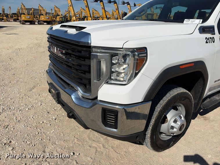 image for item FN3804 2021 GMC Sierra 3500 HD 4X4 Crew Cab flatbed pickup truck