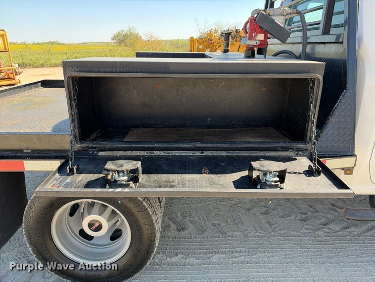 image for item FN3804 2021 GMC Sierra 3500 HD 4X4 Crew Cab flatbed pickup truck