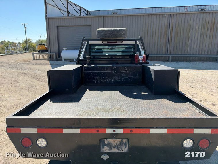 image for item FN3804 2021 GMC Sierra 3500 HD 4X4 Crew Cab flatbed pickup truck