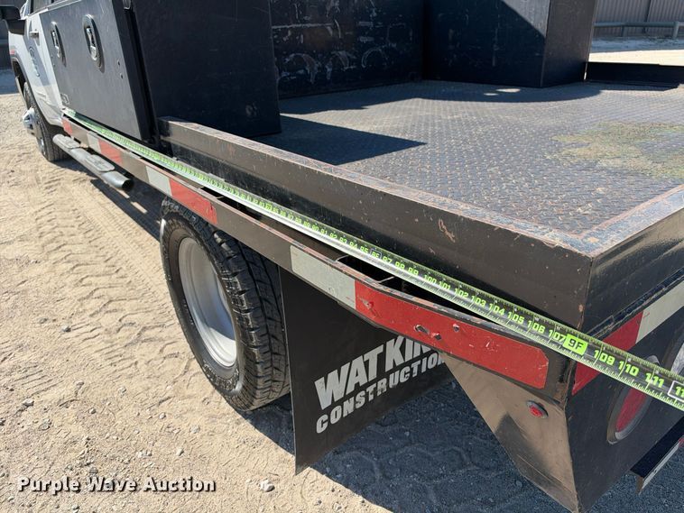 image for item FN3804 2021 GMC Sierra 3500 HD 4X4 Crew Cab flatbed pickup truck