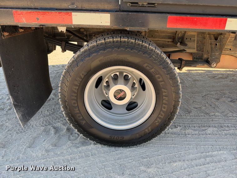 image for item FN3804 2021 GMC Sierra 3500 HD 4X4 Crew Cab flatbed pickup truck