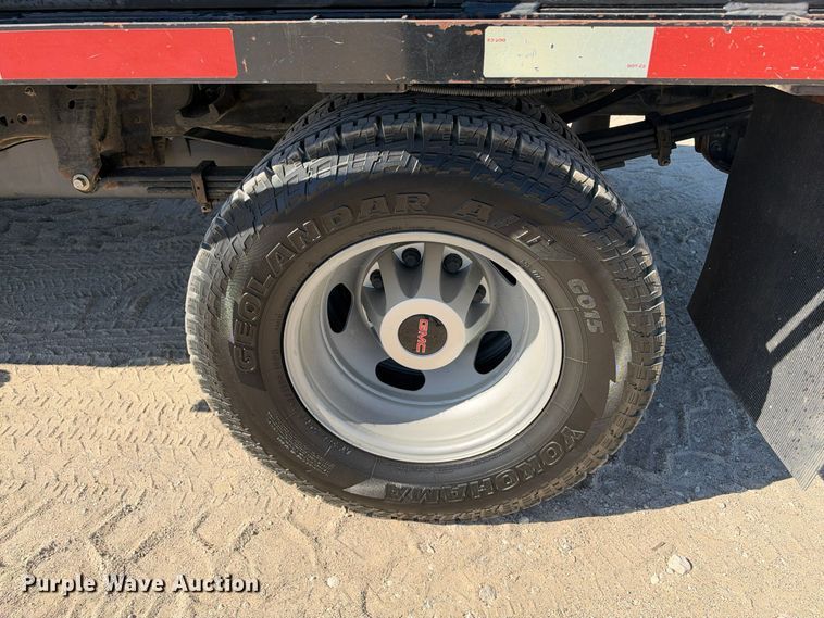 image for item FN3804 2021 GMC Sierra 3500 HD 4X4 Crew Cab flatbed pickup truck