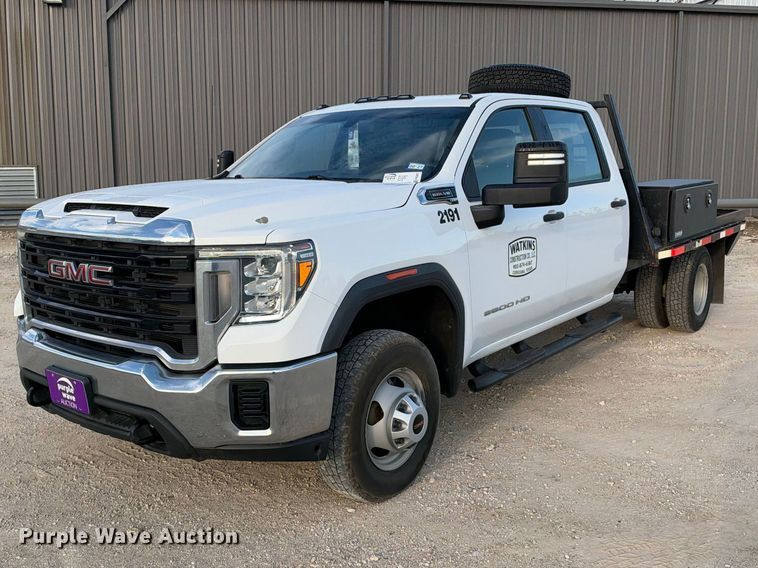image for item FN3807 2021 GMC Sierra 3500 4X4 Crew Cab flatbed pickup truck