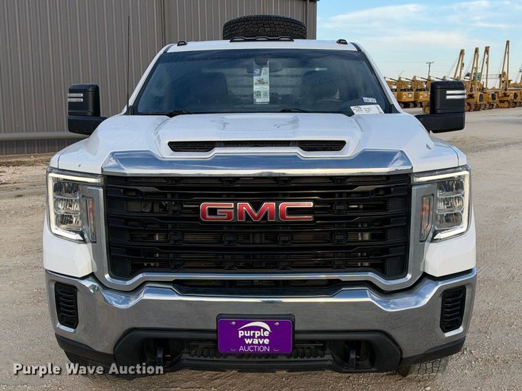 image for item FN3807 2021 GMC Sierra 3500 4X4 Crew Cab flatbed pickup truck
