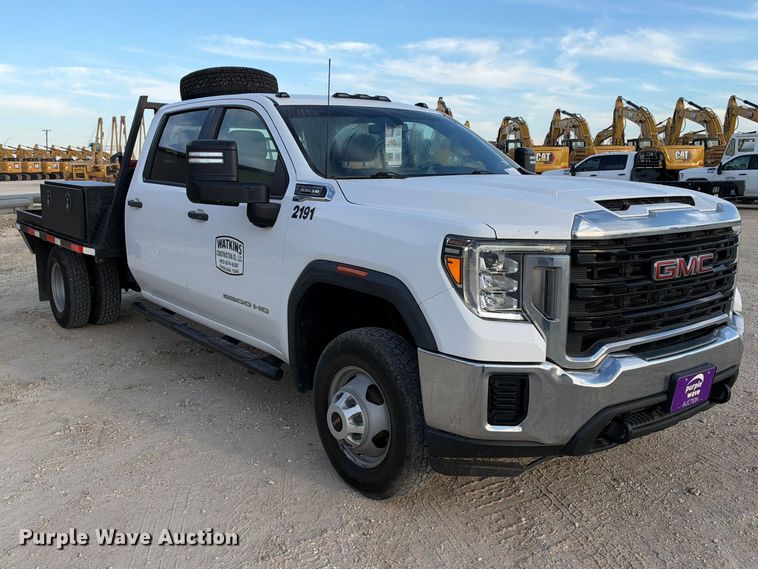 image for item FN3807 2021 GMC Sierra 3500 4X4 Crew Cab flatbed pickup truck