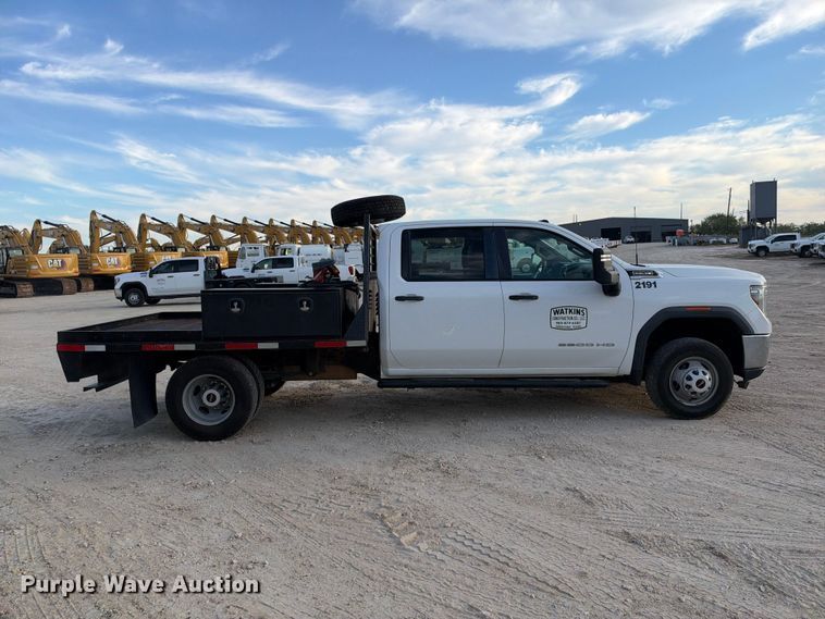 image for item FN3807 2021 GMC Sierra 3500 4X4 Crew Cab flatbed pickup truck