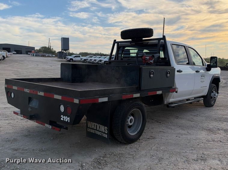 image for item FN3807 2021 GMC Sierra 3500 4X4 Crew Cab flatbed pickup truck