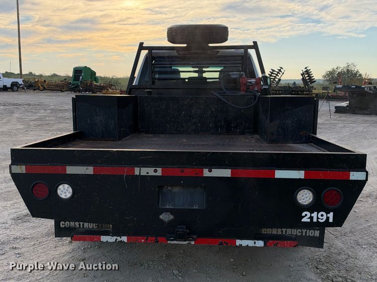 image for item FN3807 2021 GMC Sierra 3500 4X4 Crew Cab flatbed pickup truck