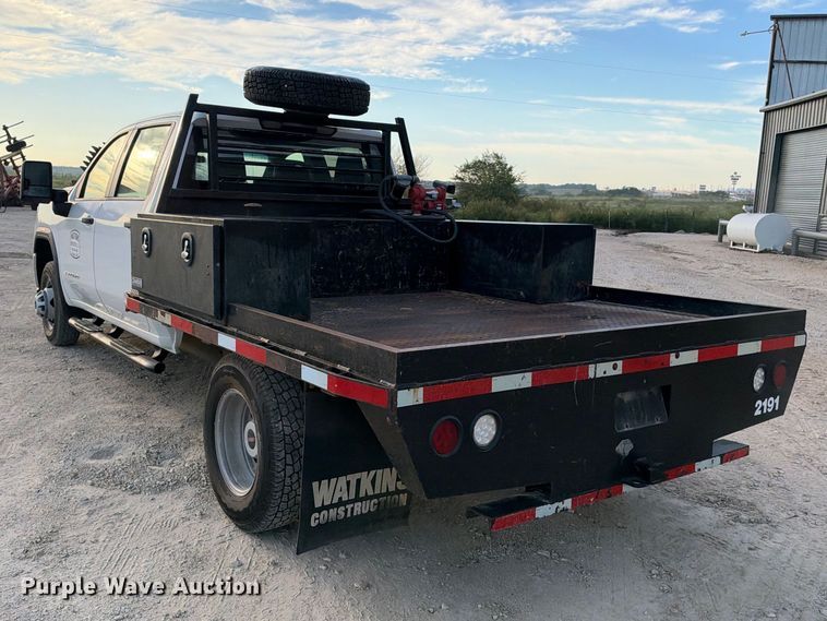 image for item FN3807 2021 GMC Sierra 3500 4X4 Crew Cab flatbed pickup truck