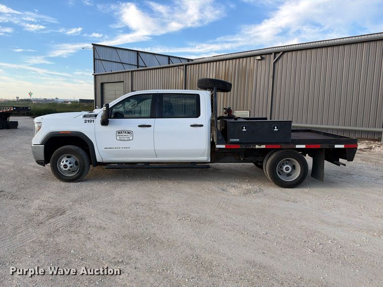 image for item FN3807 2021 GMC Sierra 3500 4X4 Crew Cab flatbed pickup truck