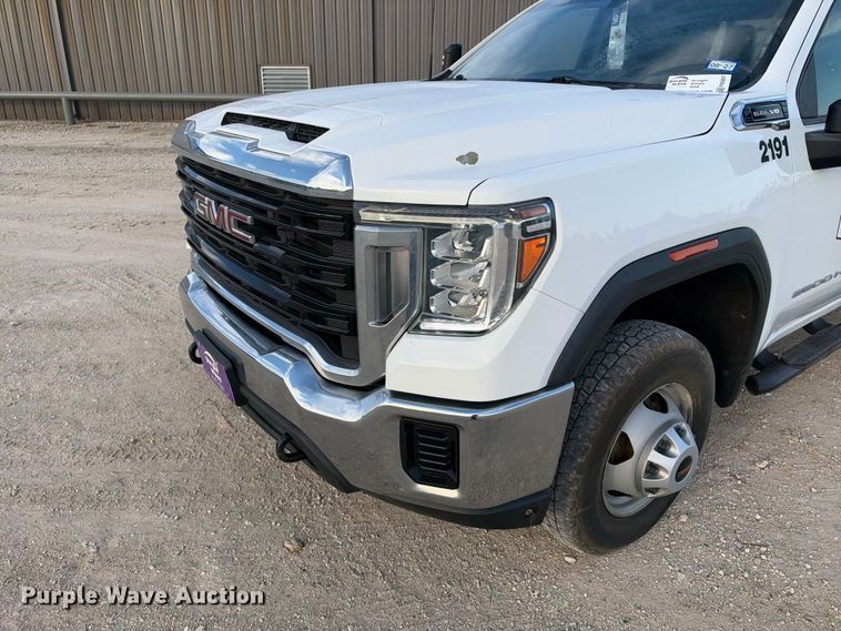 image for item FN3807 2021 GMC Sierra 3500 4X4 Crew Cab flatbed pickup truck