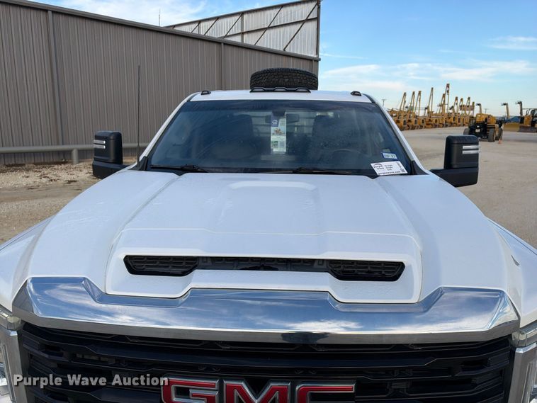 image for item FN3807 2021 GMC Sierra 3500 4X4 Crew Cab flatbed pickup truck