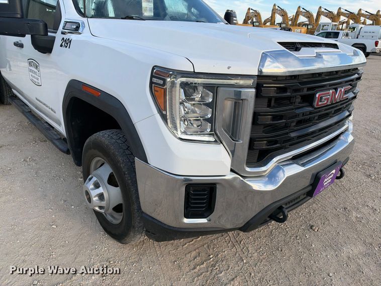 image for item FN3807 2021 GMC Sierra 3500 4X4 Crew Cab flatbed pickup truck