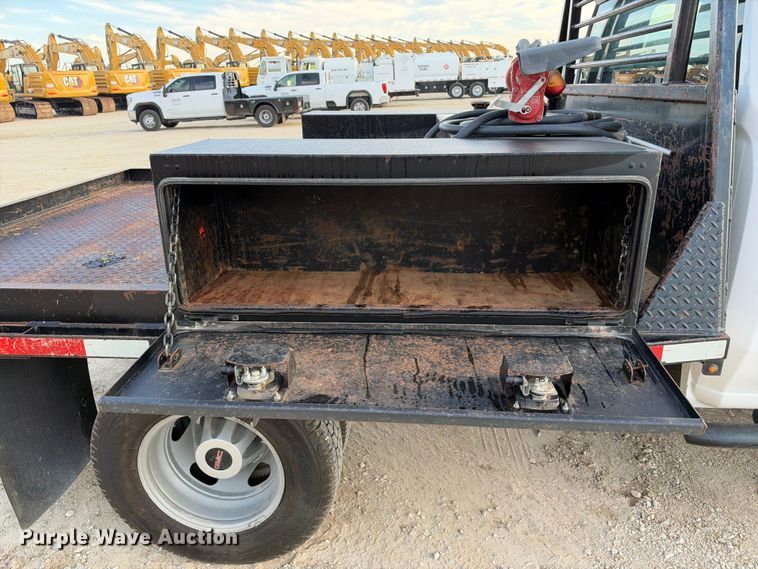 image for item FN3807 2021 GMC Sierra 3500 4X4 Crew Cab flatbed pickup truck