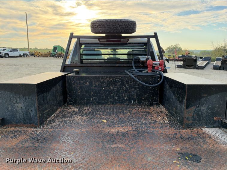 image for item FN3807 2021 GMC Sierra 3500 4X4 Crew Cab flatbed pickup truck