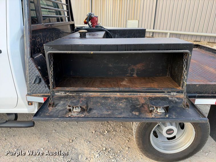 image for item FN3807 2021 GMC Sierra 3500 4X4 Crew Cab flatbed pickup truck