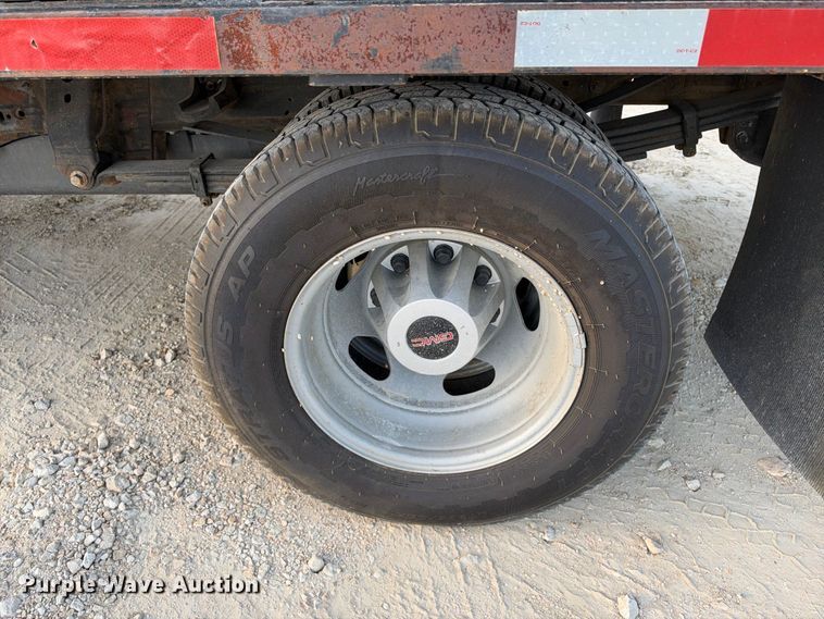 image for item FN3807 2021 GMC Sierra 3500 4X4 Crew Cab flatbed pickup truck