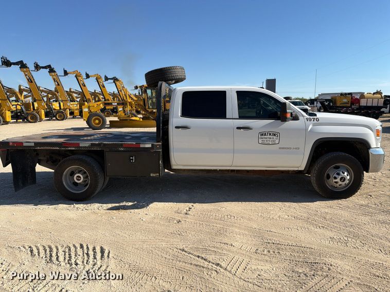 image for item FN3833 2019 GMC Sierra 3500HD 4X4 Crew Cab flatbed pickup truck