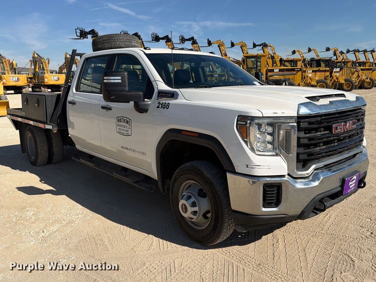 image for item FN3834 2021 GMC Sierra 3500HD 4X4 Crew Cab flatbed pickup truck