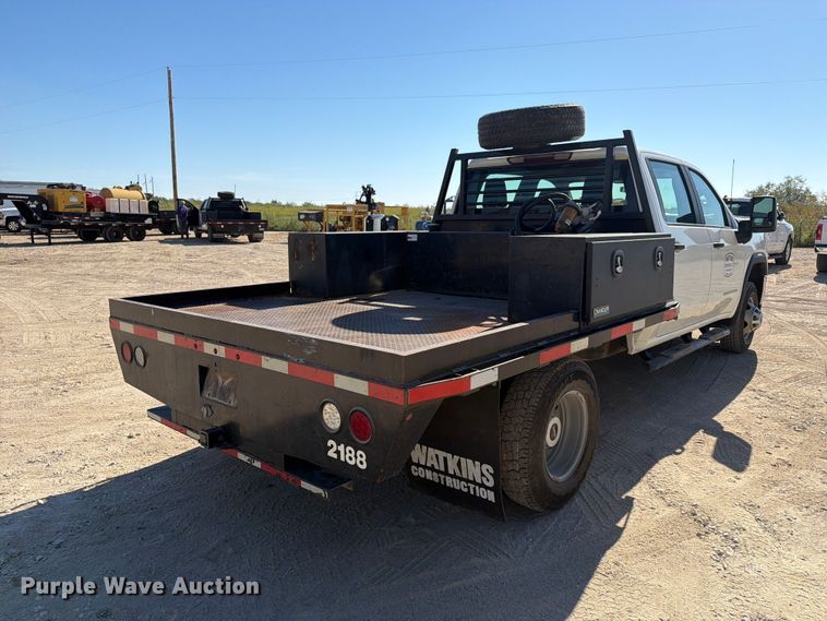 image for item FN3834 2021 GMC Sierra 3500HD 4X4 Crew Cab flatbed pickup truck