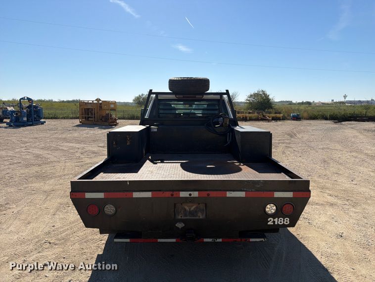 image for item FN3834 2021 GMC Sierra 3500HD 4X4 Crew Cab flatbed pickup truck