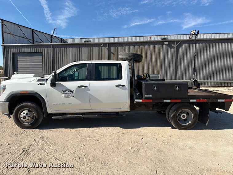 image for item FN3834 2021 GMC Sierra 3500HD 4X4 Crew Cab flatbed pickup truck