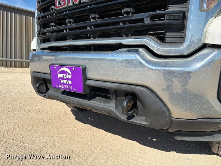 image for item FN3834 2021 GMC Sierra 3500HD 4X4 Crew Cab flatbed pickup truck