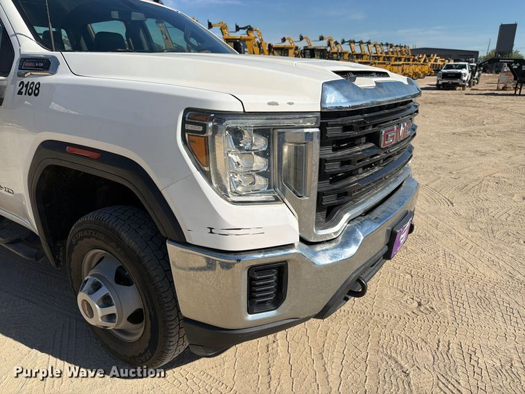 image for item FN3834 2021 GMC Sierra 3500HD 4X4 Crew Cab flatbed pickup truck