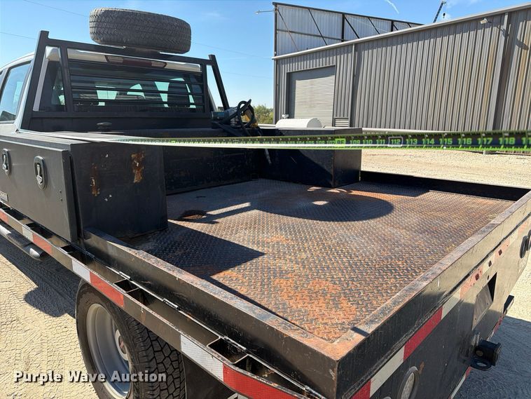 image for item FN3834 2021 GMC Sierra 3500HD 4X4 Crew Cab flatbed pickup truck