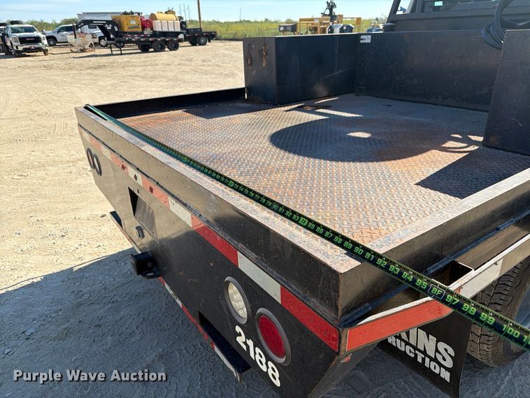 image for item FN3834 2021 GMC Sierra 3500HD 4X4 Crew Cab flatbed pickup truck