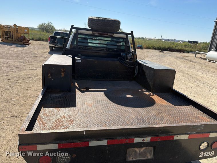 image for item FN3834 2021 GMC Sierra 3500HD 4X4 Crew Cab flatbed pickup truck