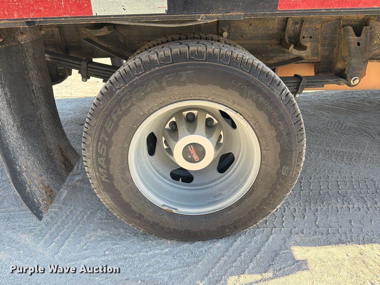 image for item FN3834 2021 GMC Sierra 3500HD 4X4 Crew Cab flatbed pickup truck