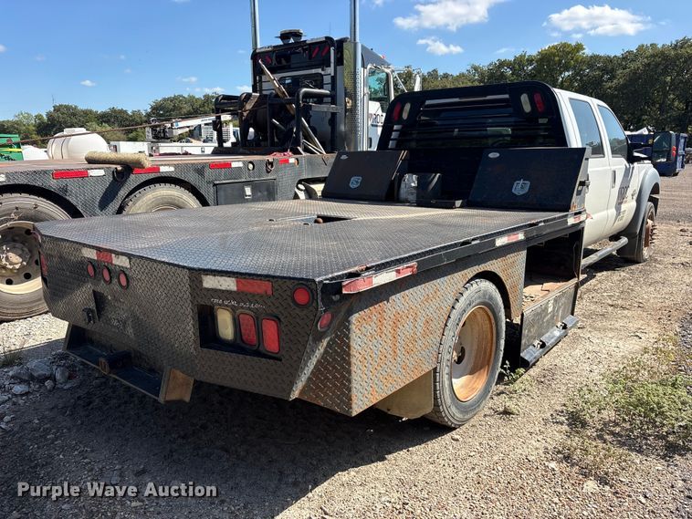 image for item ES8296 2014 Ford F550 Crew Cab flatbed truck