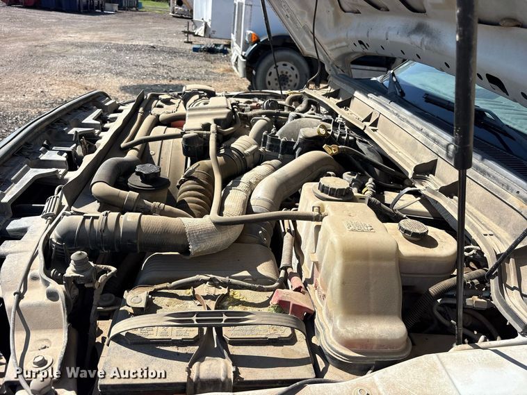 image for item ES8296 2014 Ford F550 Crew Cab flatbed truck