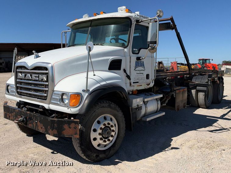 image for item EX2352 2003 Mack CV713 roll-off container truck