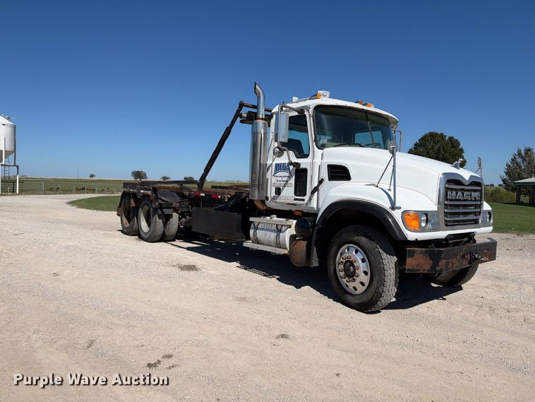 image for item EX2352 2003 Mack CV713 roll-off container truck