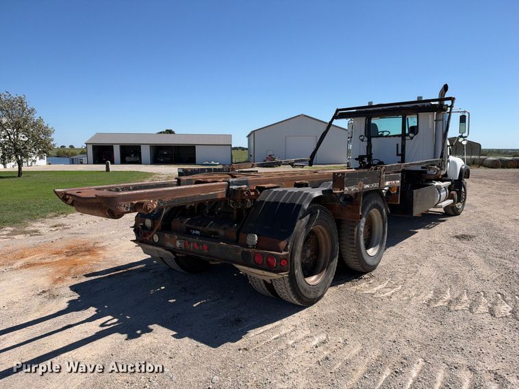 image for item EX2352 2003 Mack CV713 roll-off container truck