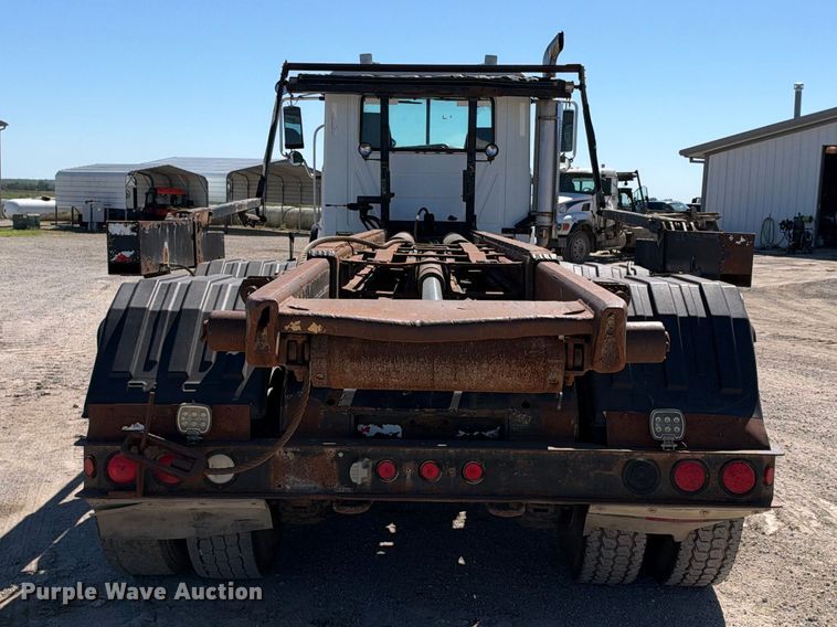 image for item EX2352 2003 Mack CV713 roll-off container truck