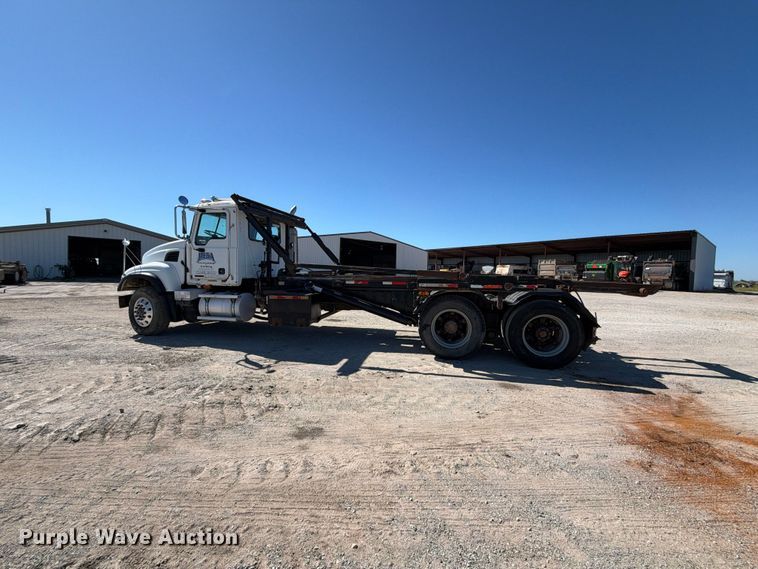 image for item EX2352 2003 Mack CV713 roll-off container truck