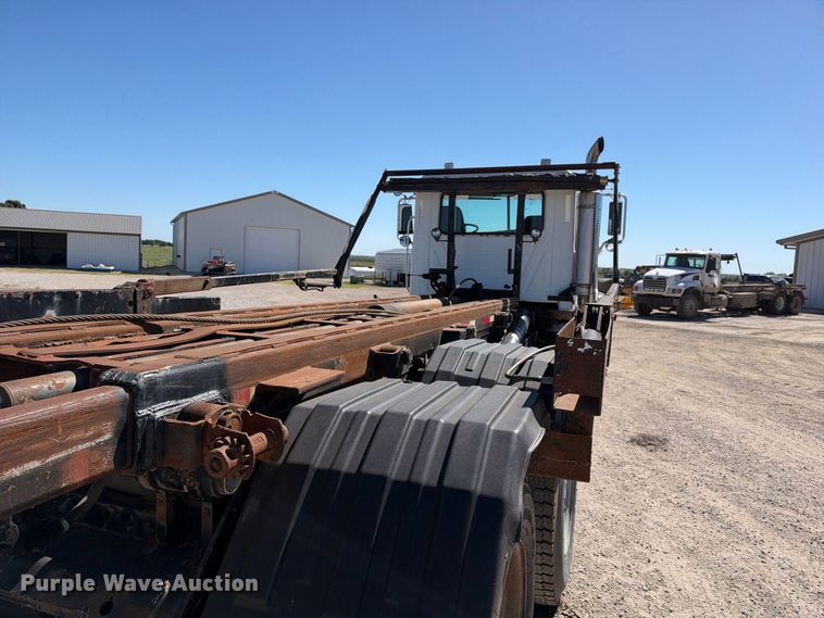 image for item EX2352 2003 Mack CV713 roll-off container truck