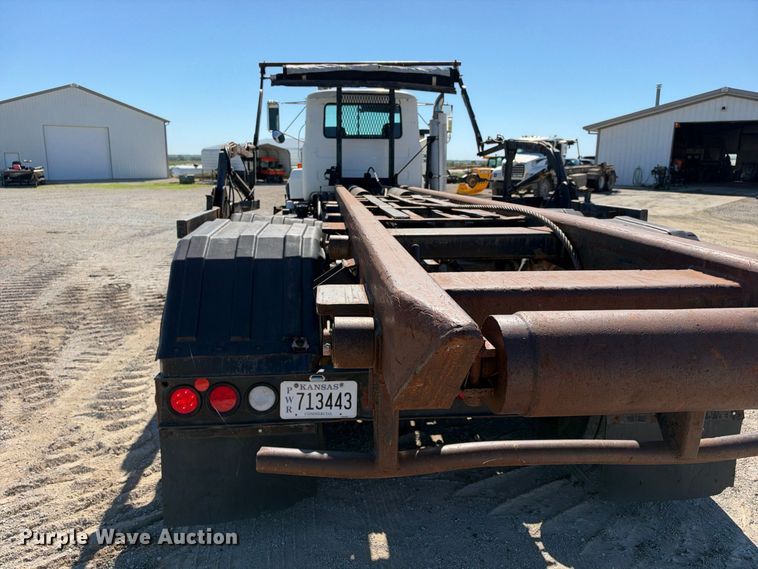 image for item EX2357 2000 Mack RD688S roll-off container truck
